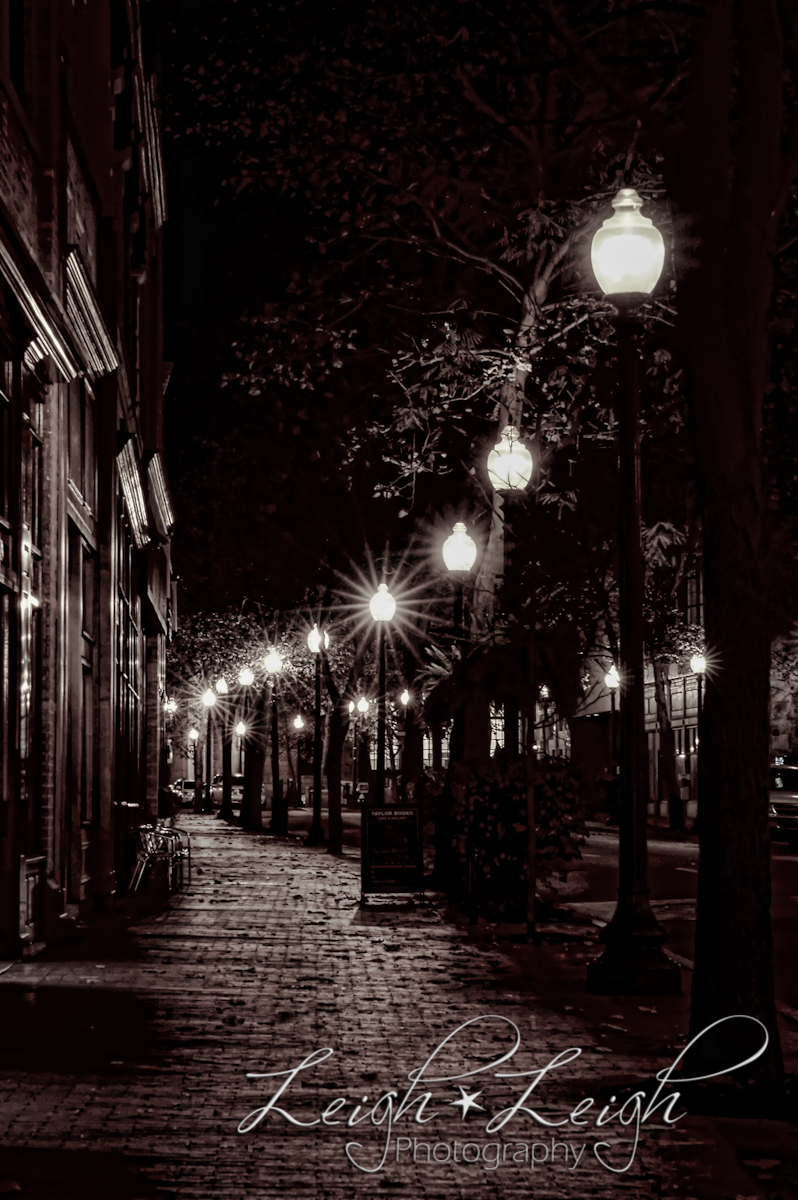 night shot of dark street with lamps