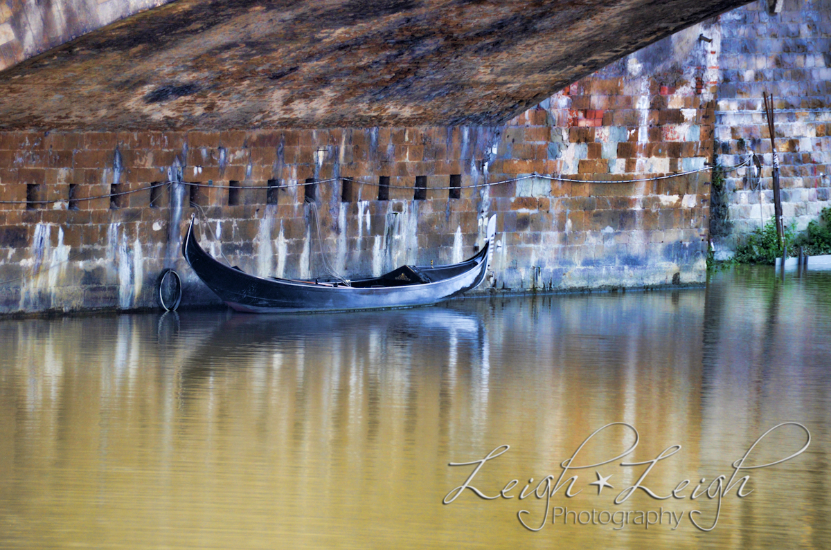 gondola under bridge