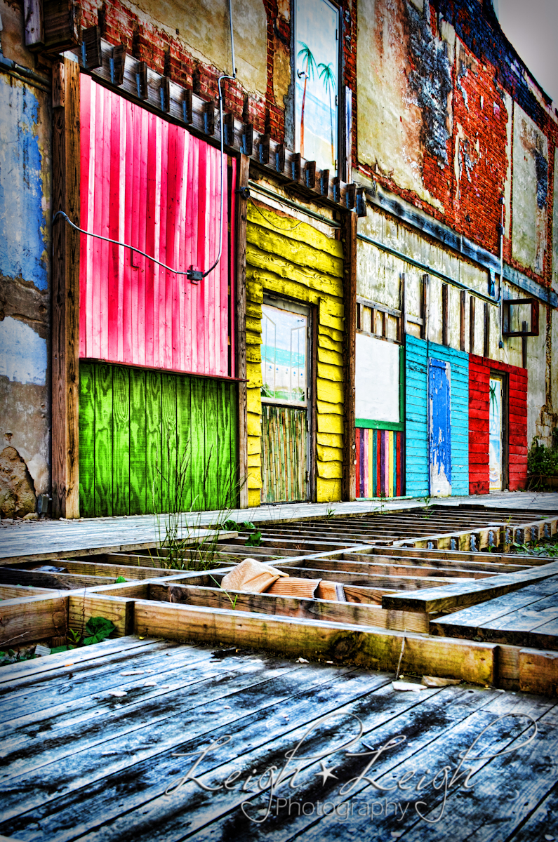 dilapidated area with brightly colored walls