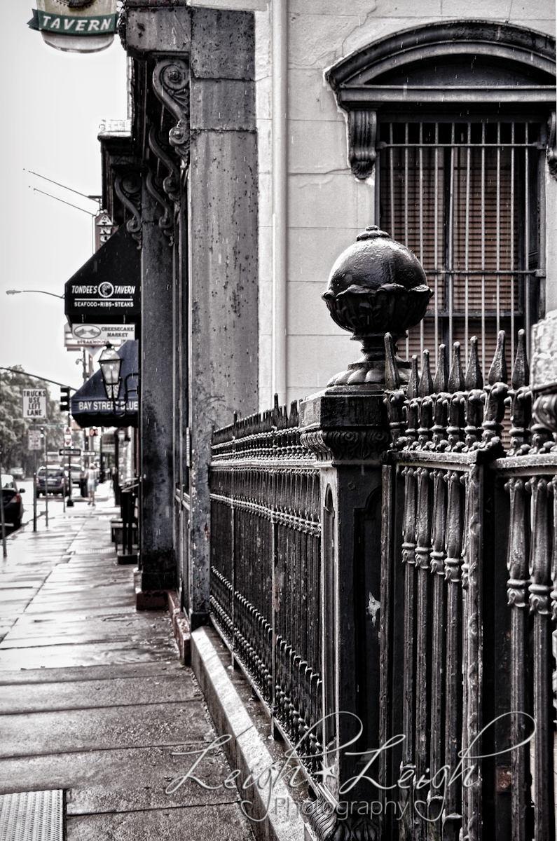 iron fence along sidewalk