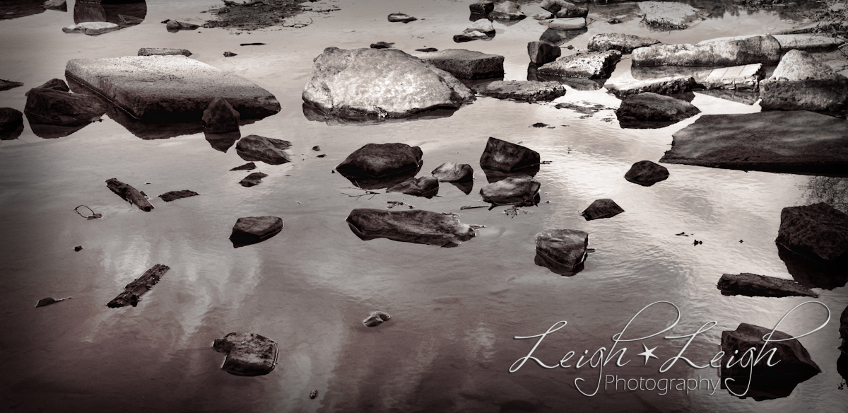 rocks in water at lake