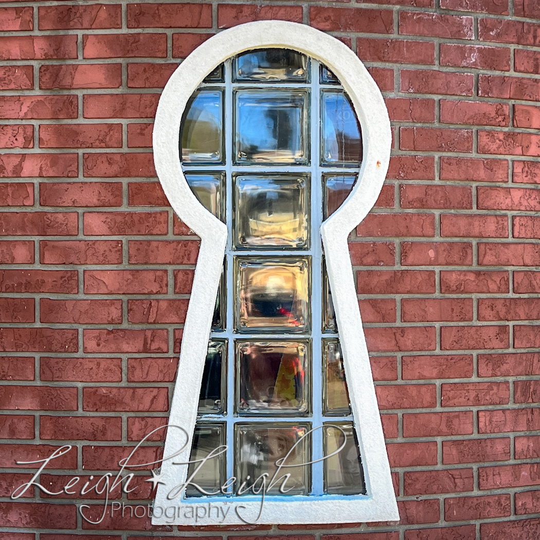 window that looks like a keyhole 