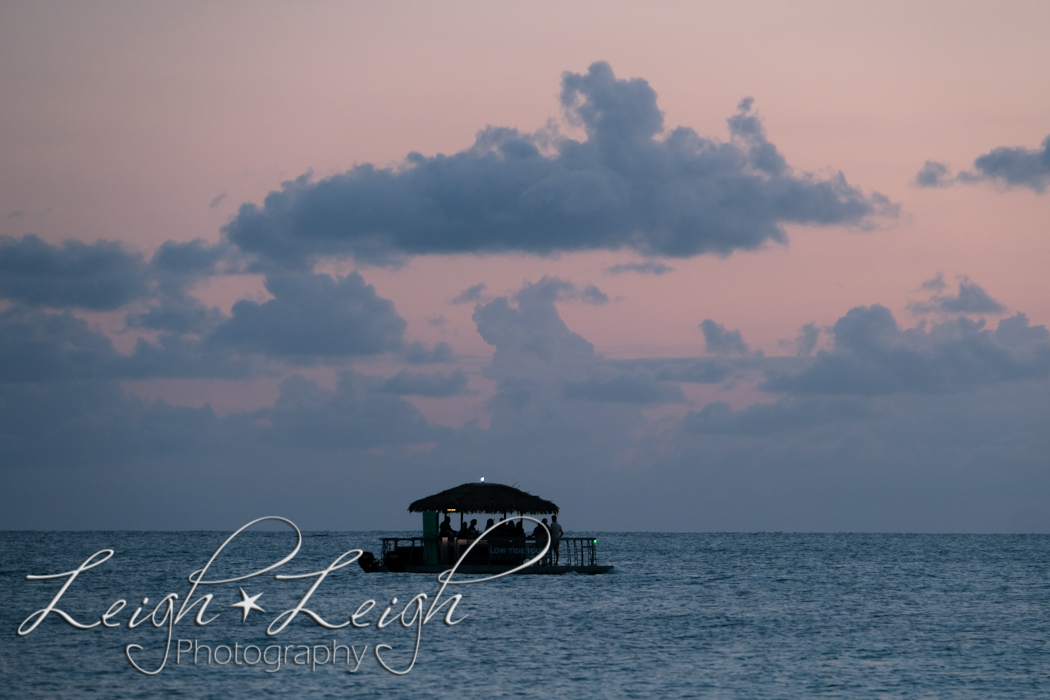 tiki hut boat out on water