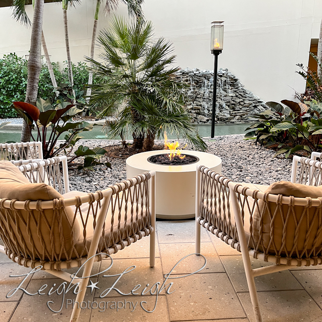 chairs on patio with fire pit