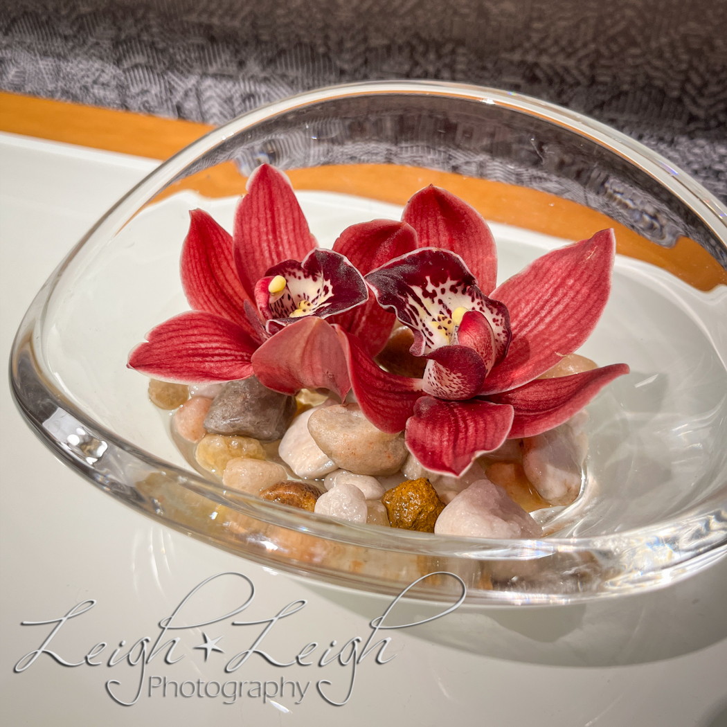 pretty flowers in glass dish decoration outside of elevator 