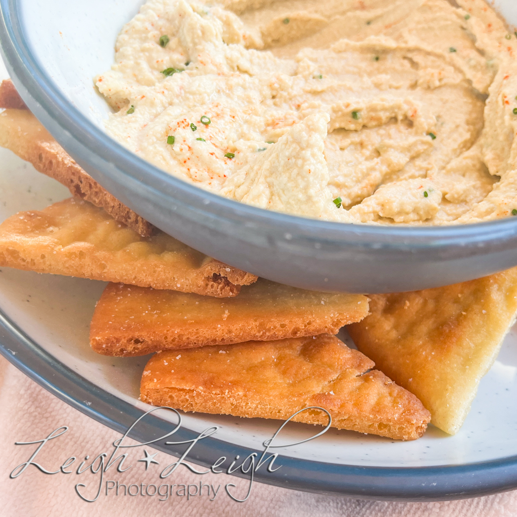 hummus and pita chips poolside 