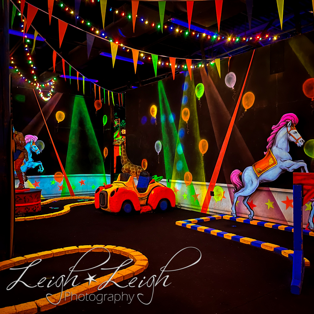 black light golf course - circus theme