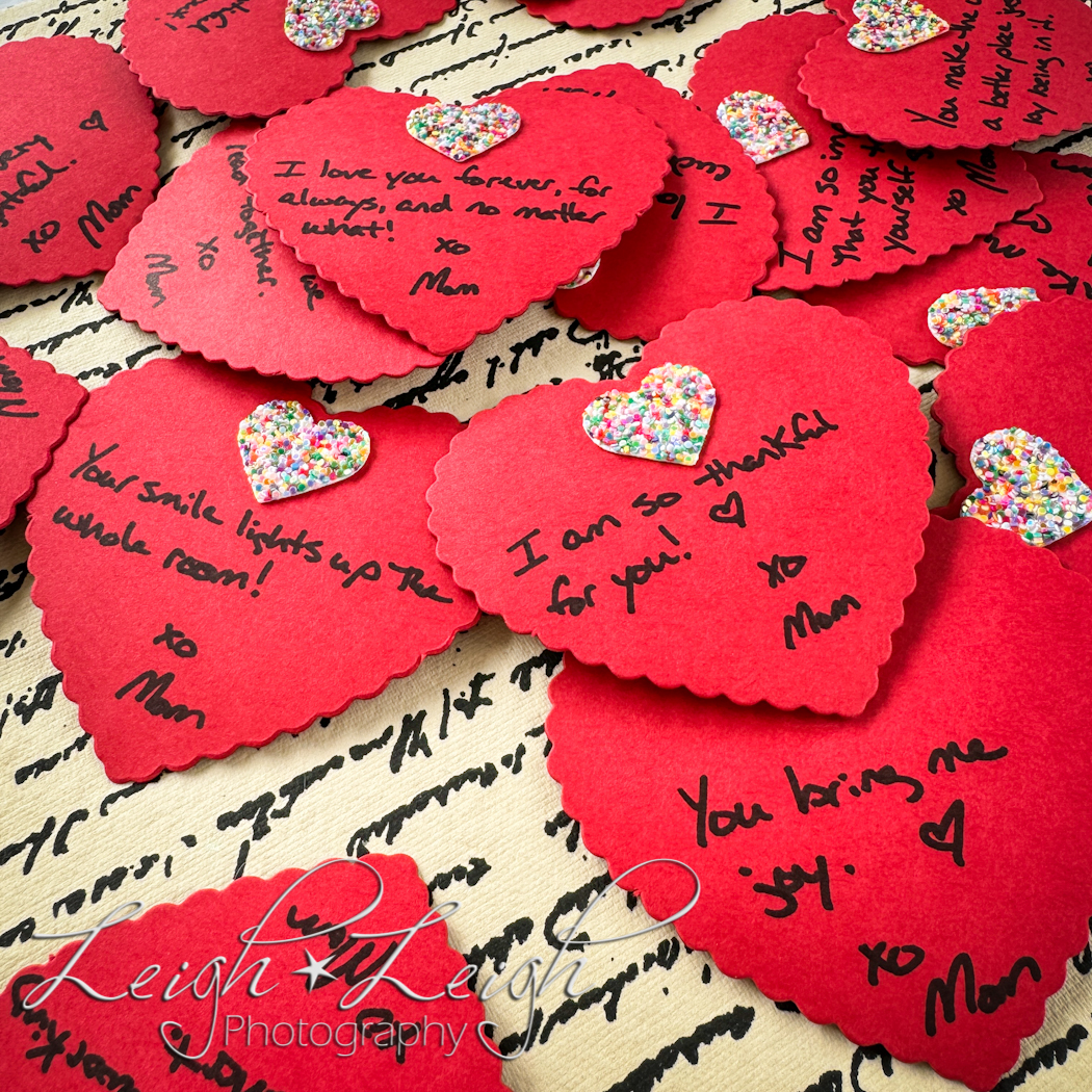 pieces of fancy heart paper with sweet notes written on them