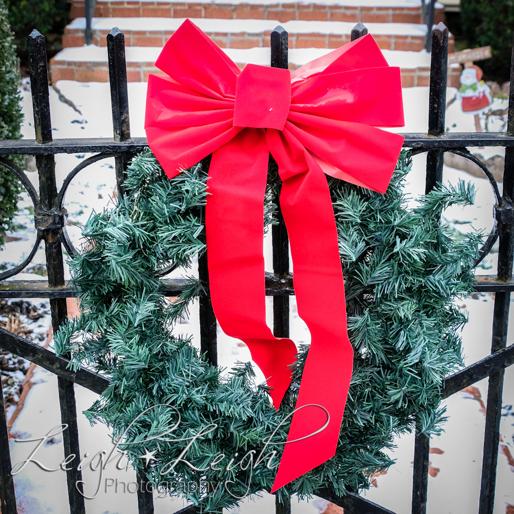 wreath on fence gate