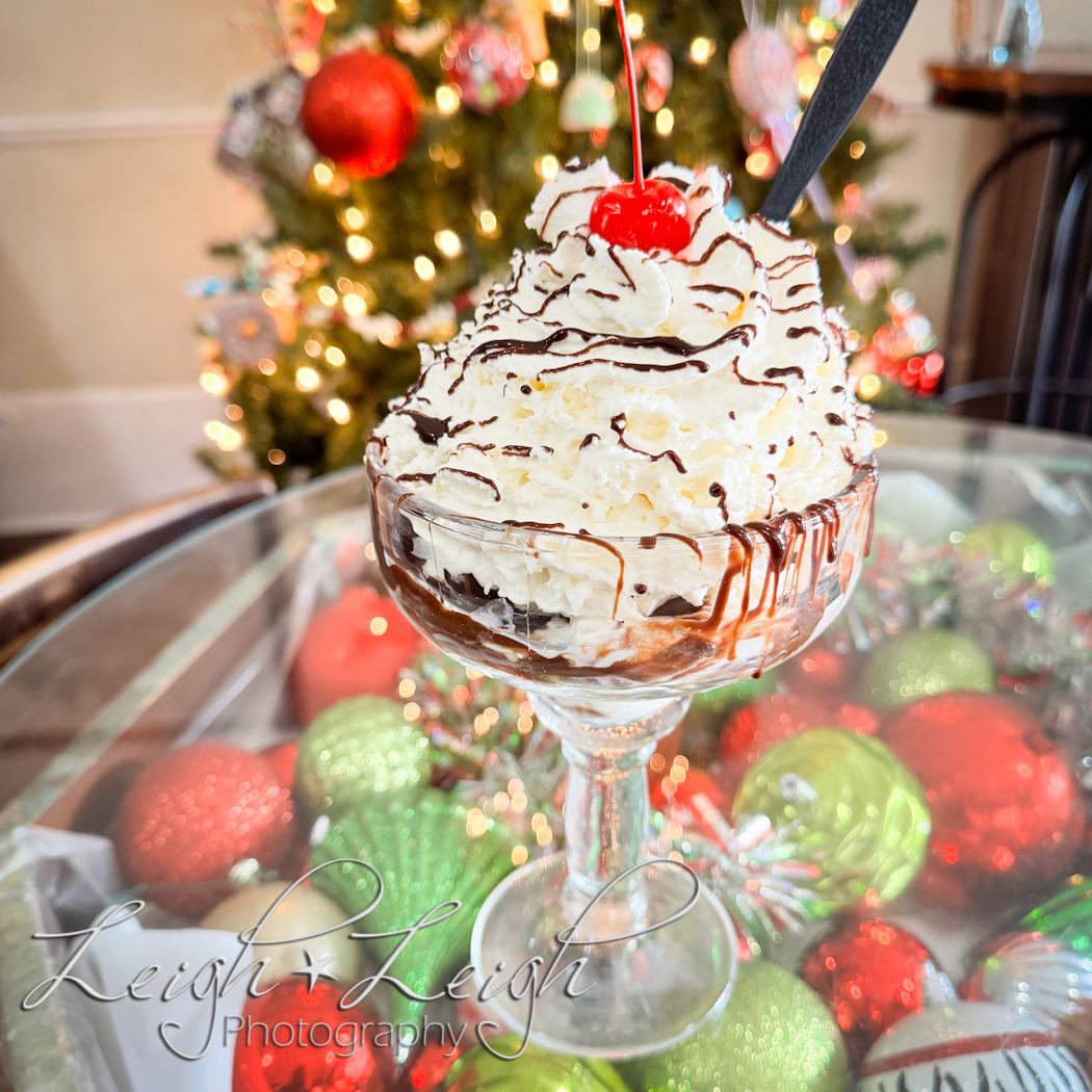 big bowl of ice cream by Christmas tree