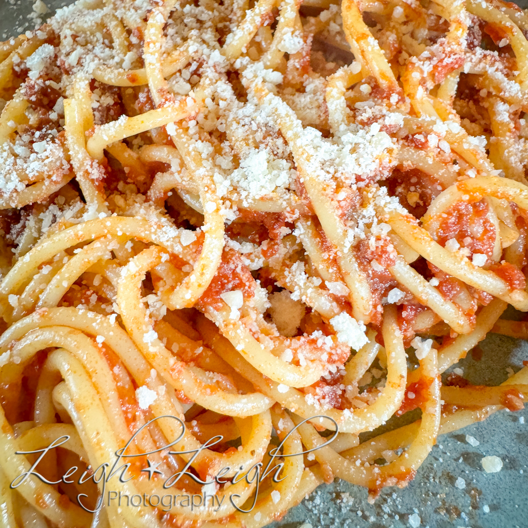 close up of a plate of spaghetti 