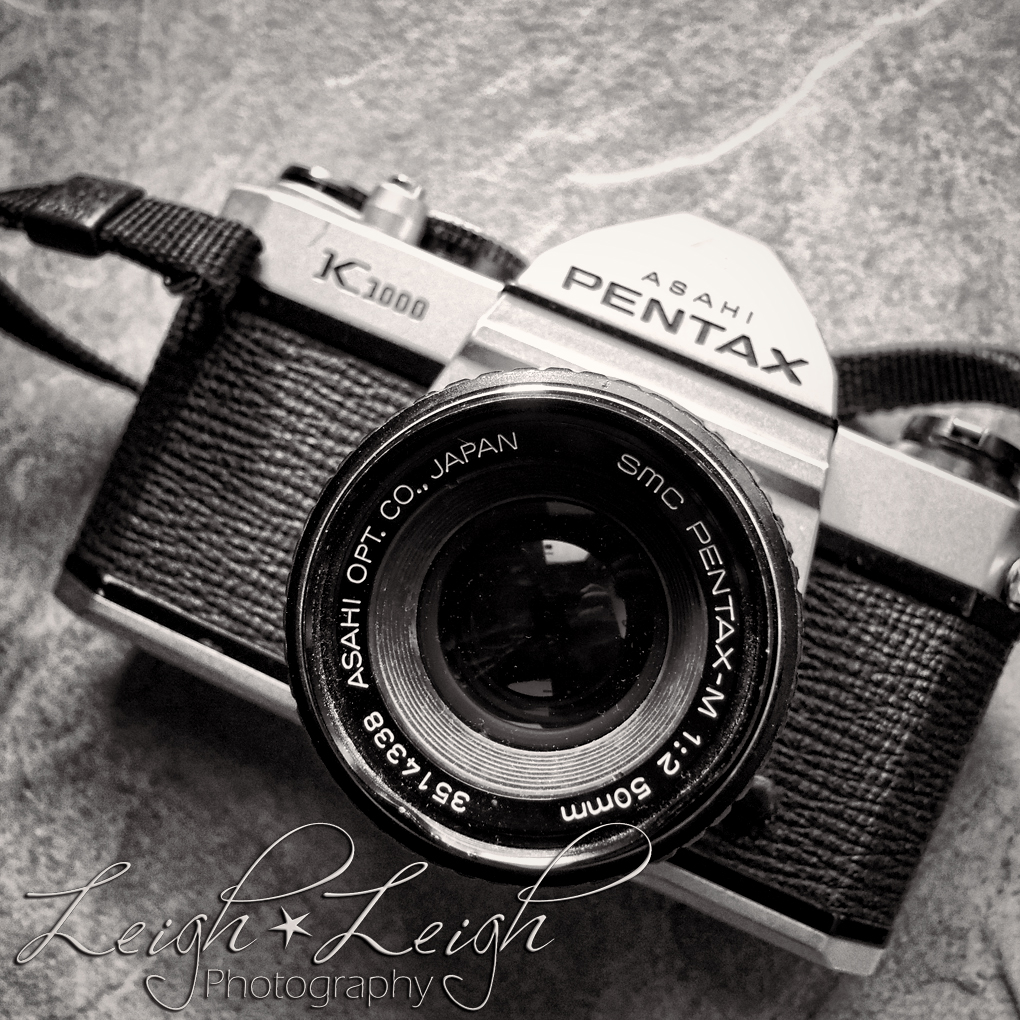 black and white picture of an old Pentax camera